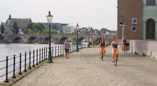 Cycling along the River Meuse in Maastricht. Photo © Holland-Cycling.com